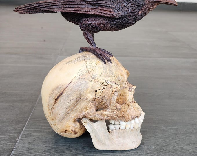 skull and raven art carving Skull in wood carving