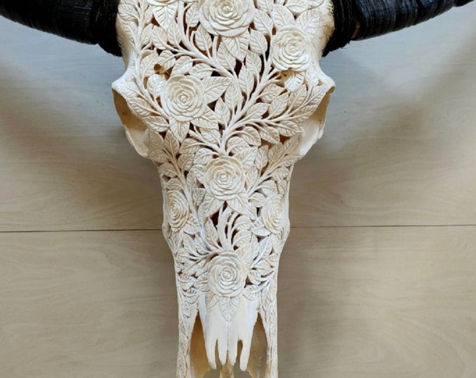 Carve buffalo skull roses with white
