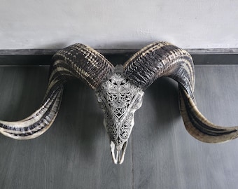 carved ram skull half mandala
