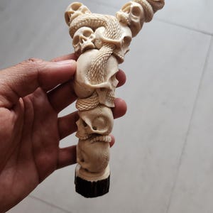 Deer antler carving knife handle hand hold skull