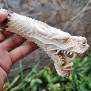 Moose antler carving dragon knife handle