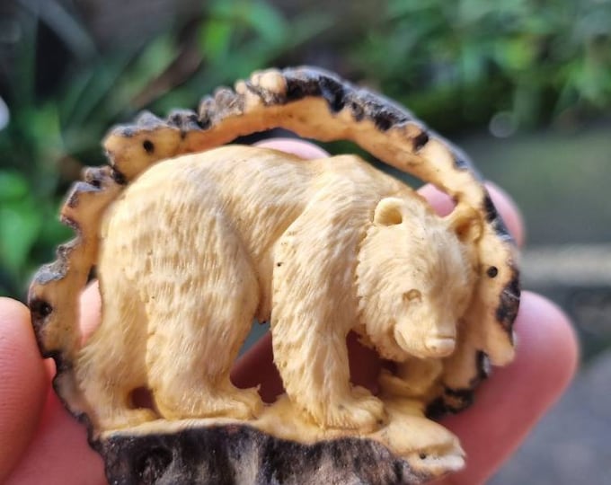 Antler carving bear foe belt