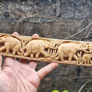 bone carving swordfish nose elephant groupe and ocean fish