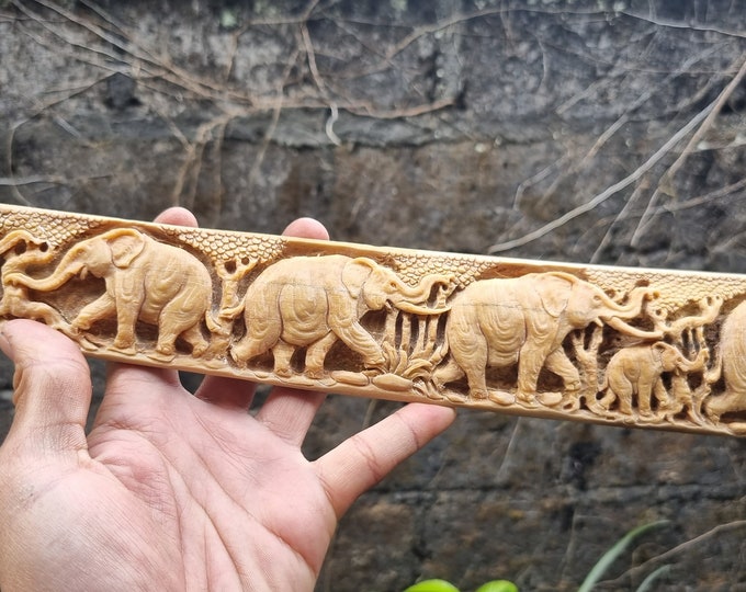 bone carving swordfish nose elephant groupe and ocean fish