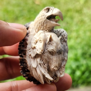 Hand-Carved Tribal Face Pendant – Natural Antler/Bone Art