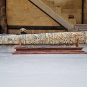 bone carving sword fish tatto