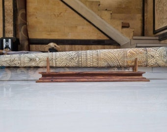 bone carving sword fish tatto