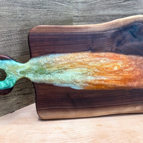 Exotic Walnut and Colorful Resin cutting/charcuterie shops board with carved handle