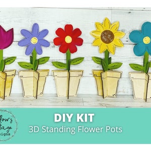 May include: DIY kit for making 3D standing flower pots. The kit includes five different flower designs: a purple tulip, a blue flower, a red flower, a yellow sunflower, and a blue flower. The flower pots are all beige.