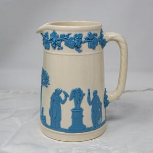 Wedgwood of Etruria and Barlaston embossed Queensware 5.5&quot; pitcher, relief decor, vintage dinnerware