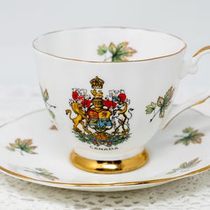 Vintage Elizabethan &quot;Canada&quot; footed teacup and saucer set, vintage bone china by Taylor&Kent, England, Coat of Arms of Canada, collectible