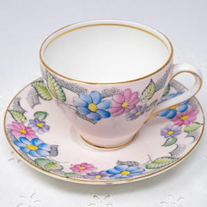 Foley gentle pink teacup and saucer set with rich floral decor, vintage bone china made in England, c.1930s