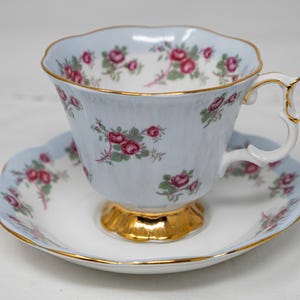 Royal Albert light blue &quot;Symphony series&quot; teacup and saucer set, Gainsborough cup shape, vintage bone china, floral decoration, golden foot