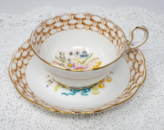 Royal Albert teacup and saucer, floral bouquet, ribbon, woven basket, vintage bone china, c.1950s, England