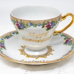 Elegant "Happy Anniversary" teacup and saucer set, pink and blue flowers, vintage bone china made in Japan