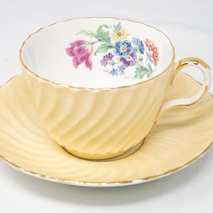 Vintage Aynsley pale yellow teacup and saucer set, bouquet of flowers, bone china
