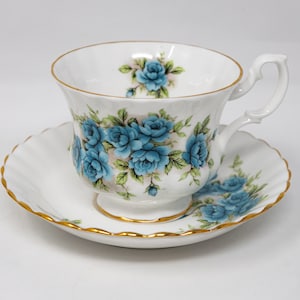 Royal Albert teacup and saucer set, blue roses decoration, vintage bone china made in England
