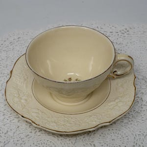 Crown Ducal teacup and saucer set, Ducal ware, ironstone, embossed, transfwerware,  A. G. Richardson and Co., England, c.1915-1930s