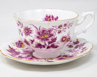 Royal Albert teacup and saucer set, purple flowers with occasional yellow petals,  vintage bone china made in England