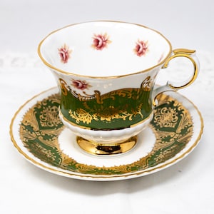 Paragon &quot;Pembroke&quot; teacup and saucer, green with filigree gold and rose buttons, vintage bone china made in England