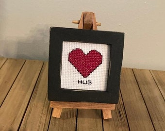 New Completed Framed Counted Cross Stitch Heart/Hug on Easel