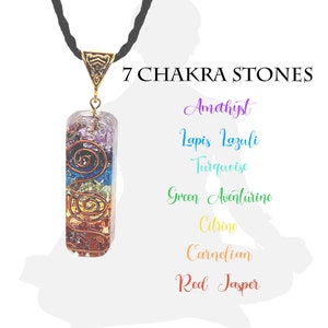 May include: A 7 chakra stone necklace with a black cord and a pendant featuring seven different colored stones in a vertical stack. The stones are amethyst, lapis lazuli, turquoise, green aventurine, citrine, carnelian, and red jasper. The pendant is made of clear resin and has a copper wire wrapped around it.
