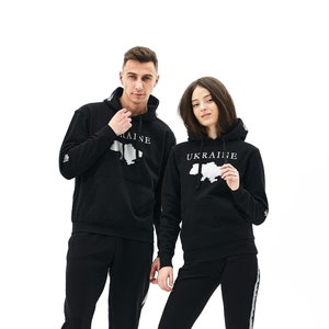 Matching sweatsuit couples 2025