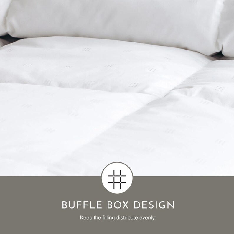 May include: White down comforter with a baffle box design. The design helps keep the filling evenly distributed.