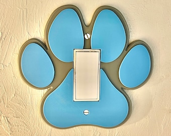 Placa y cubierta decorativas para interruptor de luz con forma de pata de perro (interruptor basculante)