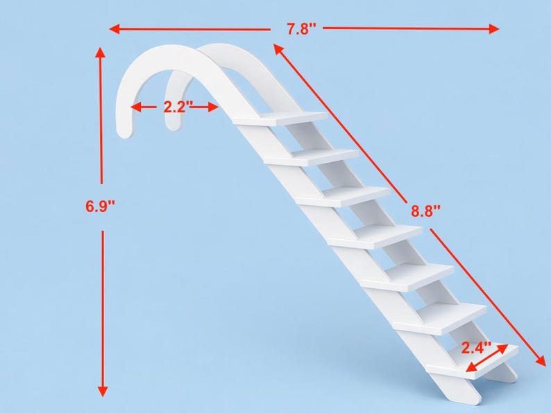 May include: A white wooden ramp with stairs, measuring 6.9 inches high, 7.8 inches wide, and 8.8 inches long. The ramp has a curved top and six steps. The width of the top curve is 2.2 inches, and the depth of the steps is 2.4 inches.