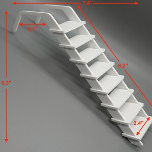 May include: A white, miniature staircase with seven steps. The overall dimensions are 6.3 inches in height, 7.6 inches in width, and 8.2 inches in length. Each step is 2.4 inches wide. The top section extends 2.1 inches.