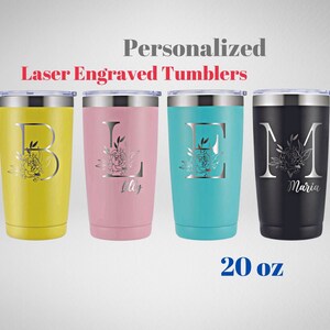 May include: Four 20 ounce stainless steel tumblers with personalized laser engraved floral designs and names. The tumblers are yellow, pink, blue, and black.