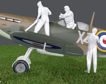 May include: A scale model of a World War II fighter aircraft featuring a camouflage paint scheme of brown and green with a black propeller. Five white unpainted figures are positioned around the plane, including one seated in the cockpit.