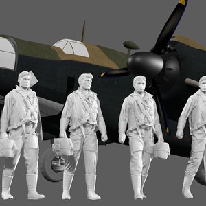 以下が含まれることがあります： 濃い緑と茶色の飛行機の前に立っている、軍服を着た男性の白いプラスチック製フィギュア5体。男性たちは、小さな長方形の物体を手に持っている。