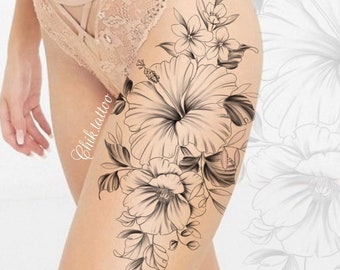 May include: Black and white line art tattoo design of a floral bouquet with hibiscus flowers and leaves. The tattoo design is on a person's leg.
