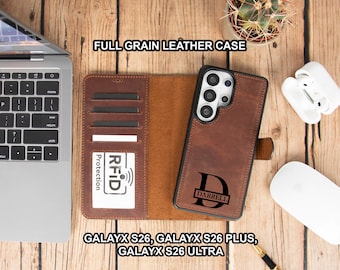 May include: A brown leather phone case with a wallet design, featuring the text "FULL GRAIN LEATHER CASE". The case has card slots and RFID protection. The phone case is personalized with the name "DARRELL" and the letter "D". Compatible with Galayx S26, S26 Plus, and S26 Ultra.
