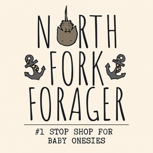 a logo for a company called "North Fork Forager". The logo features a cat sitting on top of an anchor, with the text "North Fork Forager" written below. The company's slogan, "Stop Shop For Baby Onesies", is also included in the image.