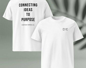 May include: Two white t-shirts. One shirt has the text "CONNECTING IDEAS TO PURPOSE" and "EVERYDAY HEROES CO." printed in black on the back. The other shirt has "EHC" printed in black on the front.