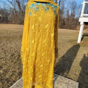 Beautiful yellow chikankari on pure chiffon.  Pakistani designer wear.