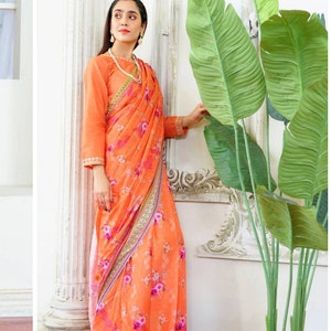 Beautiful orange ready to wear saree with blouse and paticoat. Size XL