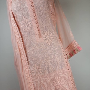 Gorgeous light pink chikankari formal wear.