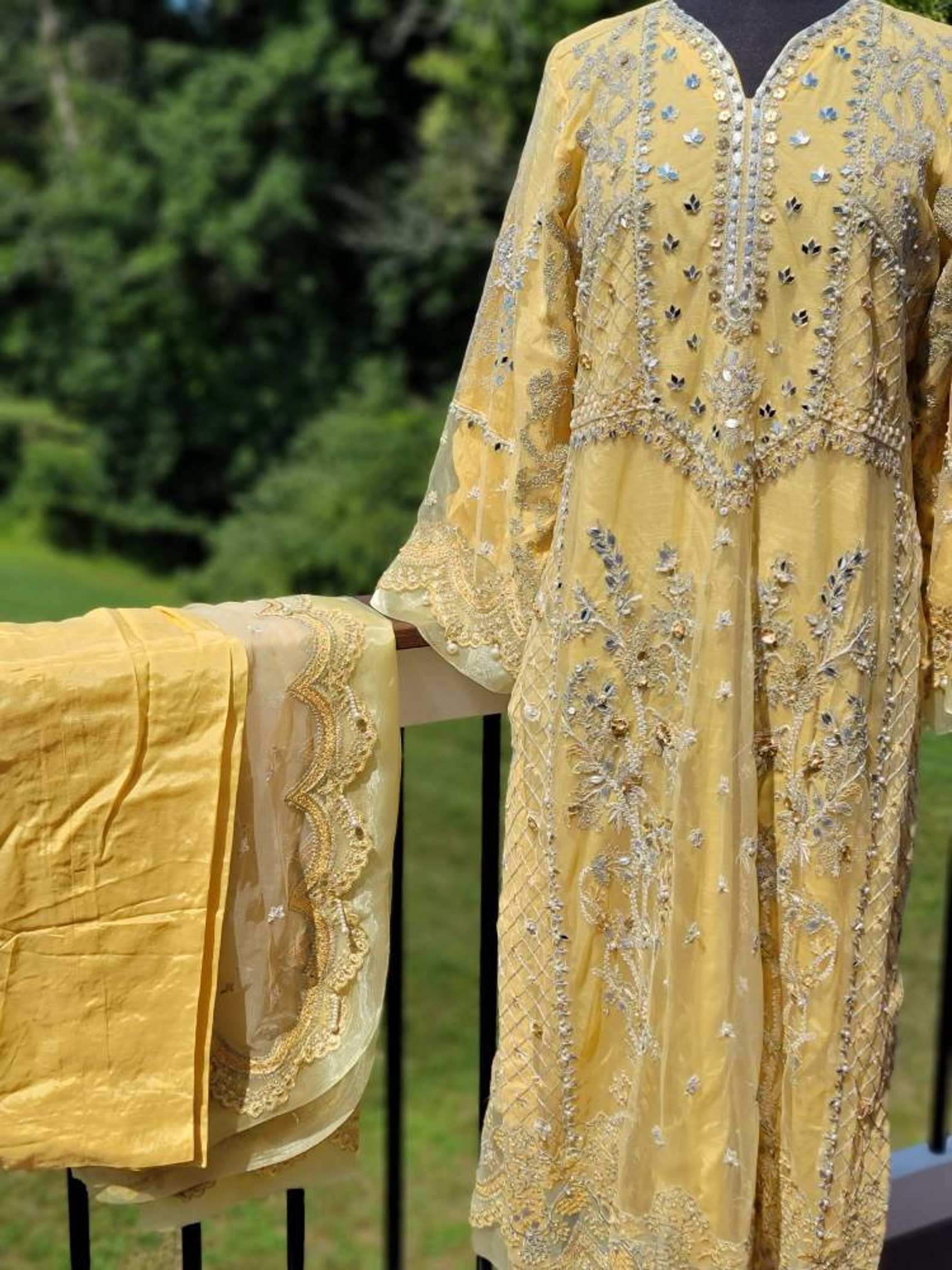 Yellow Net Shirt and Duppata With Raw Silk Pant. Pakistani Designer