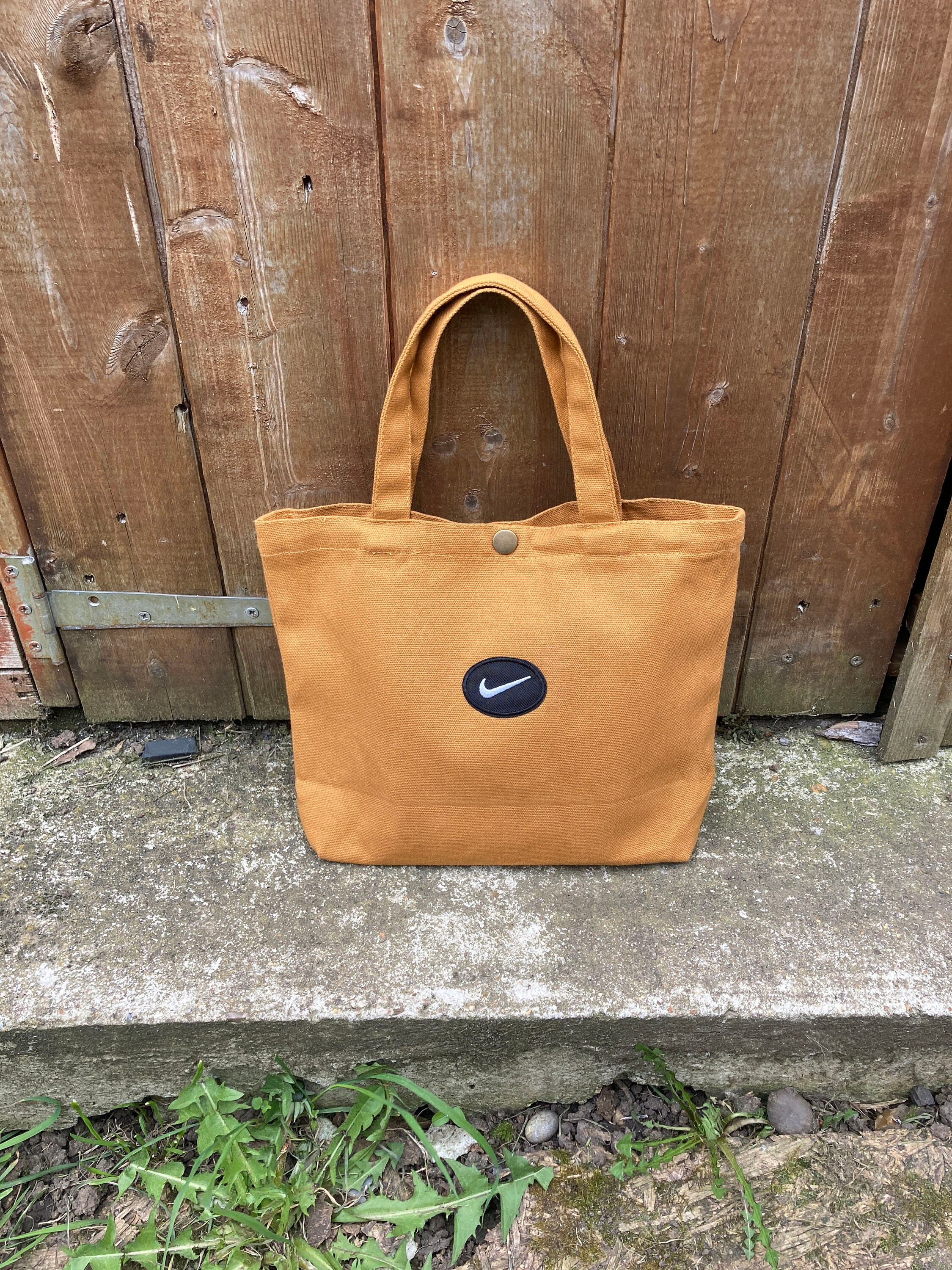 Nike Swoosh Canvas Tote Bag in Natural