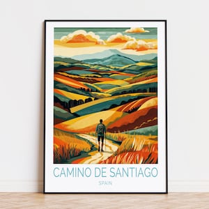 May include: A poster with a colorful illustration of a hiker walking on a path through rolling hills. The text "Camino de Santiago" and "Spain" is at the bottom of the poster.