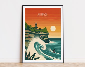Puede incluir: Una ilustración colorida de un templo en un acantilado con vistas a una ola turquesa con un surfista montando la ola. El texto "ULUWATU" y "BALI, INDONESIA" está impreso en blanco sobre un fondo rojo y naranja.