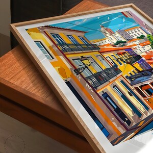 May include: A colorful illustration of a street scene in Lisbon, Portugal. The image features a yellow building with balconies, a red and yellow tram, and a blue sky with white clouds.