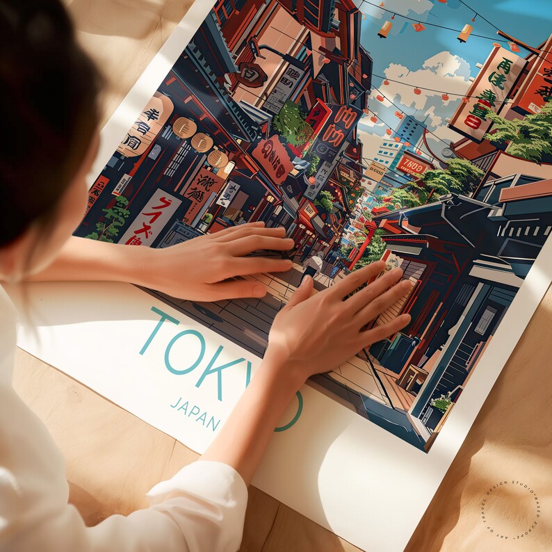 May include: A colourful illustration of a street scene in Tokyo, Japan. The image features traditional Japanese architecture, street vendors, and people walking down the street. The text "TOKYO" and "JAPAN" are printed in blue at the bottom of the image.