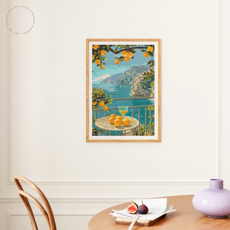 May include: A colorful illustration of a balcony overlooking the ocean in Sorrento, Italy. The balcony has a table with a glass of lemonade and oranges on it. The text "SORRENTO ITALY" is printed on the image.