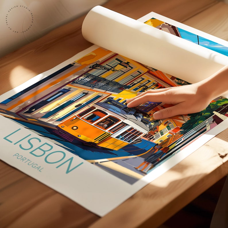 May include: A colorful illustration of a yellow tram traveling through a street in Lisbon, Portugal. The tram is surrounded by colorful buildings and palm trees. The text "LISBON" and "PORTUGAL" is printed in blue and white on the bottom of the image.