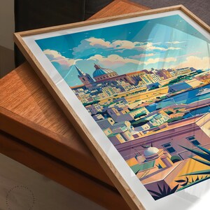 May include: A colorful illustration of a cityscape with a large church building in the center. The city is surrounded by water and has a bright blue sky with white clouds. The illustration is framed in a wooden frame.
